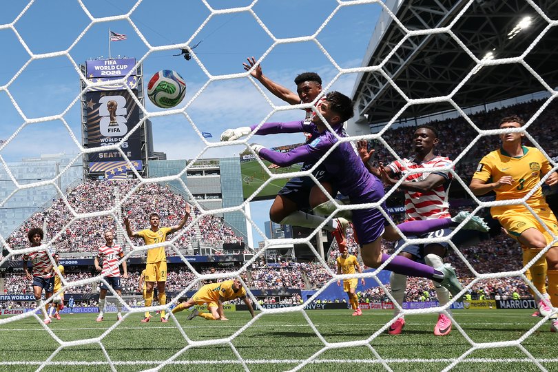 Alex Freeman #16 of the United States heads to score the team's second goal.