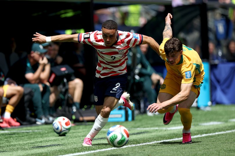 Sergino Dest #2 of the United States controls the ball against Jordan Bos 