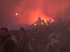 Flares were set off among the crowd of thousands as Fans watched the Socceroos take on the USA. (Con Chronis/AAP PHOTOS)