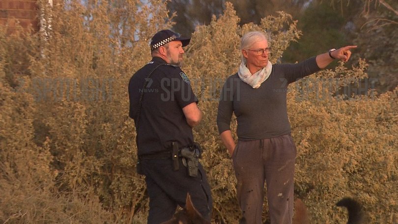 Josie Murray talking to police during the search for Gus Lamont