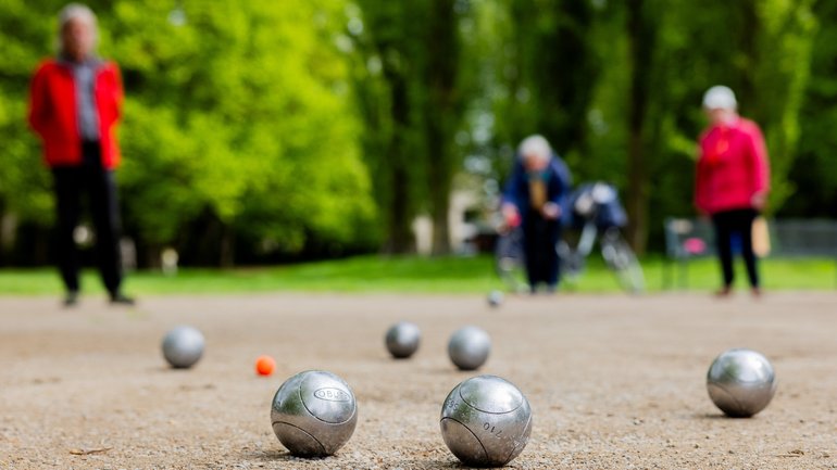 A man is dead and another is in custody after an argument reportedly broke out about pétanque boules.