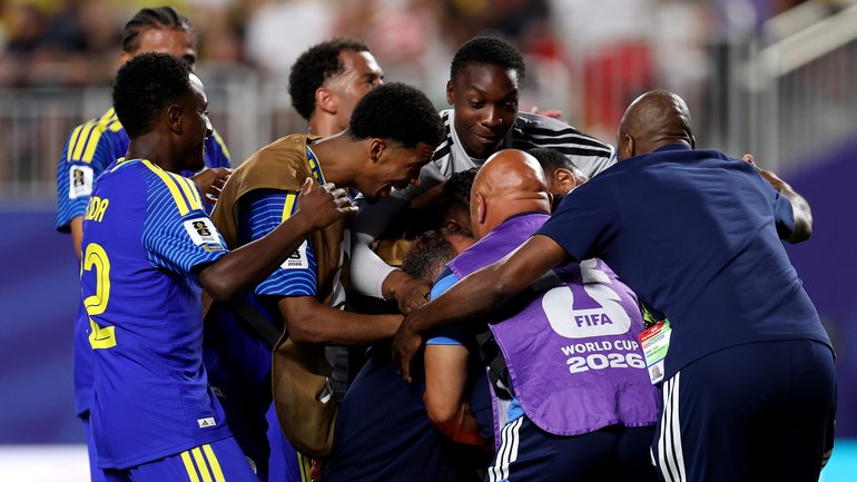 Curacao players react after the 0-0 draw.