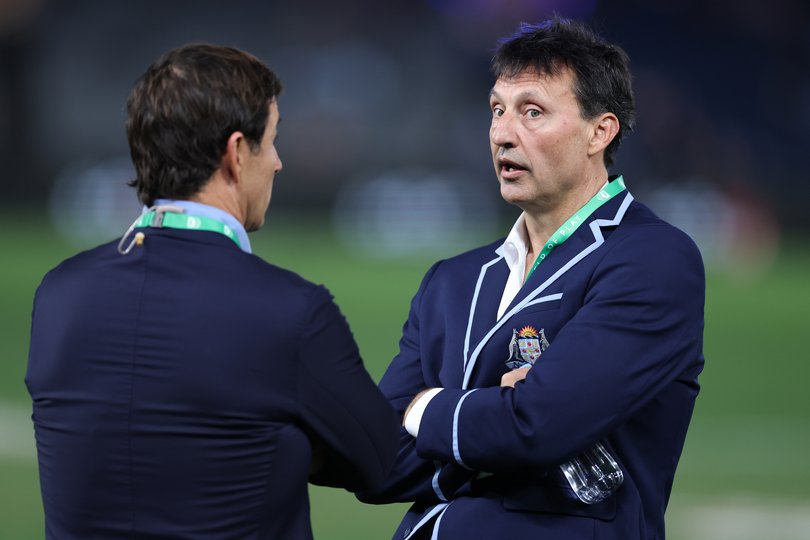 Laurie Daley head coach of the Blues speaks to Andrew Johns.