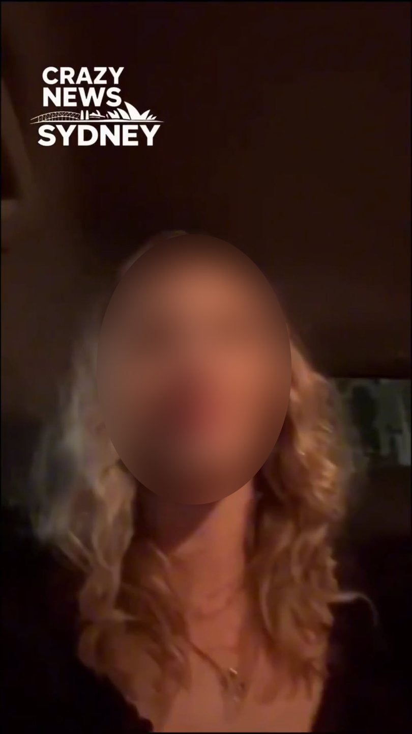 A blonde woman appeared to be filming the incident.