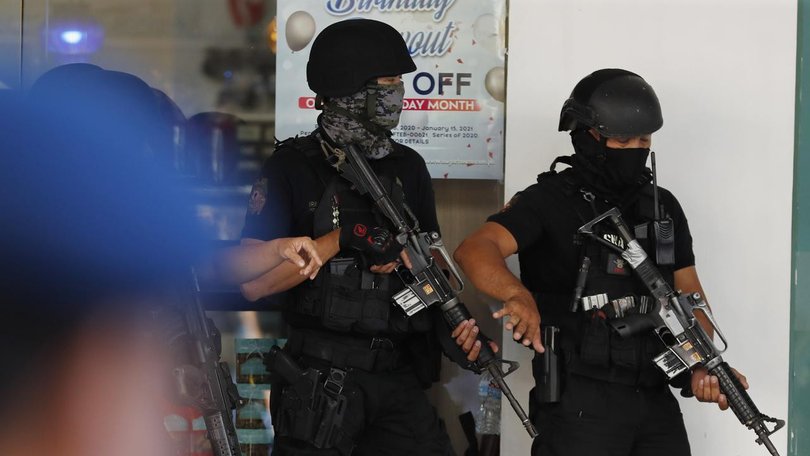One suspect has been arrested and another is on the run after a school shooting in The Philippines.