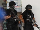 One suspect has been arrested and another is on the run after a school shooting in The Philippines.