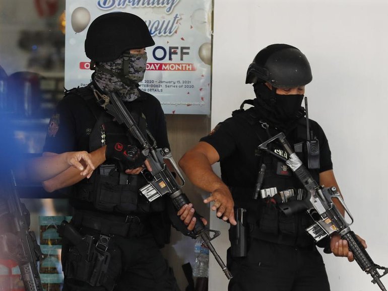One suspect has been arrested and another is on the run after a school shooting in The Philippines.