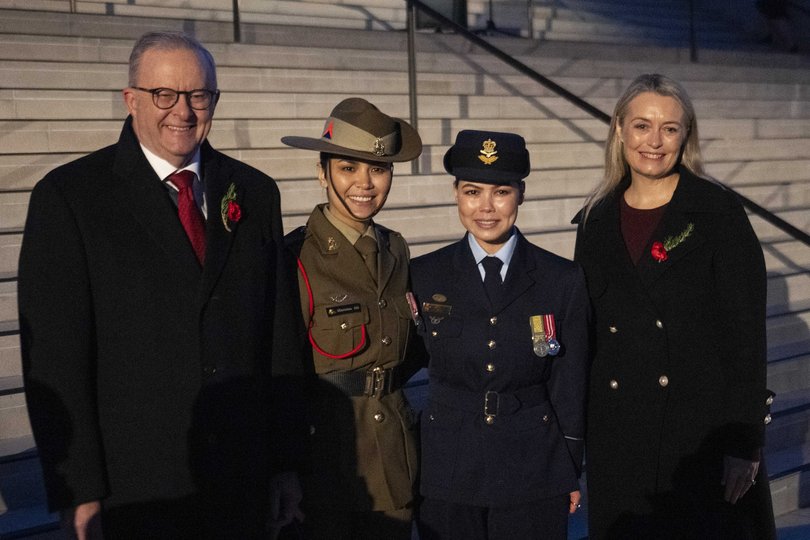 Prime Minister Anthony Albanese and Jodie Haydon with Flying Officer Kbora Ali at the Anzac Day Dawn Service at the Australian War Memorial. Mr Albanese will use his speech at its opening on Tuesday evening to say the War Memorial helps the flame of memory burn brighter.