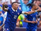 Kylian Mbappe has blasted home a brace in his milestone match for France against Iraq. (AP PHOTO)