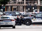 Montreal police work the scene of a shooting in Montreal.