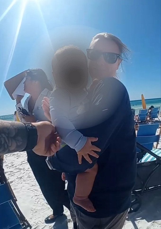 Police arrive to find the baby in the care of Good Samaritans.