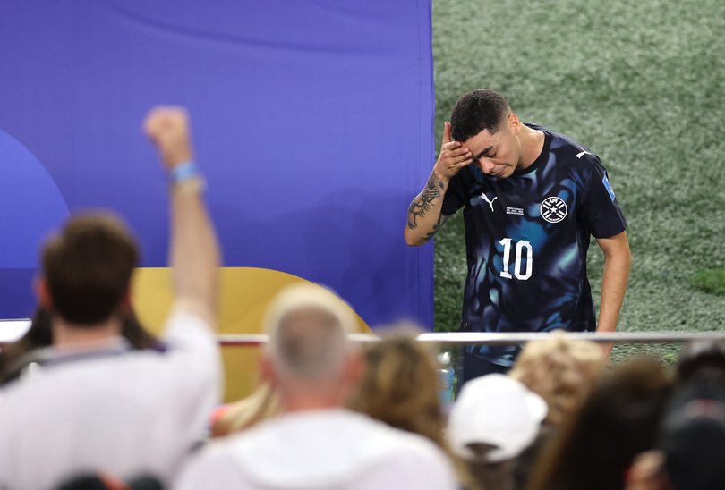 SANTA CLARA, CALIFORNIA - JUNE 19: Miguel Almiron #10 of Paraguay reacts after receiving a red card for covering his mouth while talking to another player during the FIFA World Cup 2026 Group D match between Türkiye and Paraguay at San Francisco Bay Area Stadium on June 19, 2026 in Santa Clara, California. (Photo by Stu Forster/Getty Images)