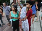  Evacuated people wait at Parque Central urban development complex after a magnitude 7.2 earthquake struck Venezuela and other regions in the Caribbean on June 24, 2026 in Caracas, Venezuela.