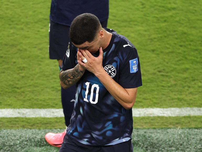 Miguel Almiron #10 of Paraguay reacts after receiving a red card.