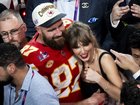 Taylor Swift hugs Travis Kelce after the Chiefs won Super Bowl LVIII in 2024. 