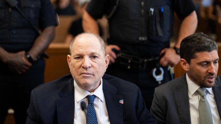 Harvey Weinstein had a neutral expression after a judge formally dismissed a charge against him.