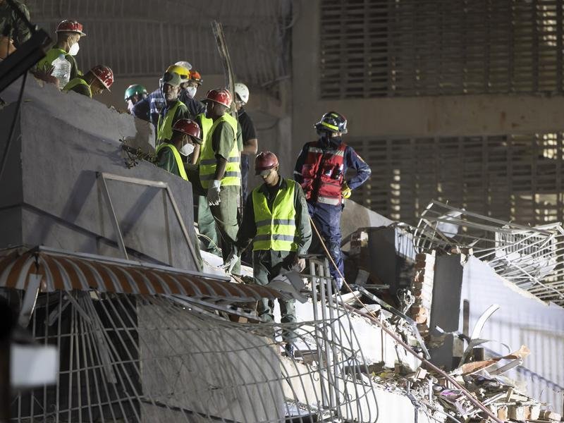 Emergency responders are searching the rubble in Caracas as the quake death toll climbs. 