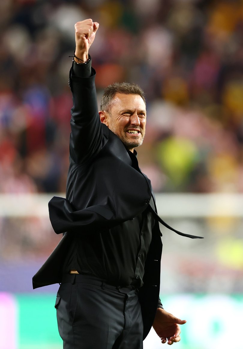 Head coach Tony Popovic celebrates Australia’s draw.