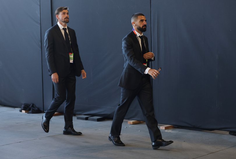 Connor Metcalfe #8 and Aziz Behich #16 of Australia arrive before the FIFA World Cup 2026 Group D match between Paraguay and Australia.