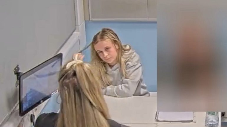 Footage shows a calm, unbothered nursery worker.