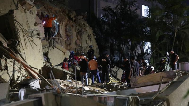 Emergency responders searching the rubble in Caracas.