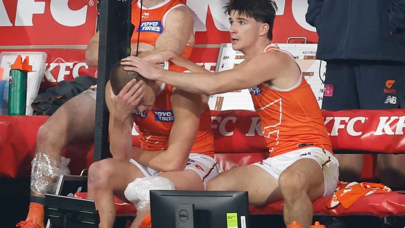 Gruzewski was consoled by teammates on the bench. 