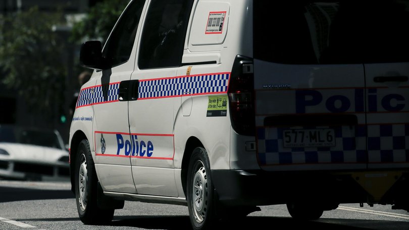 A man armed with a rifle has been shot by Queensland Police after a confrontation with officers on Friday night. 