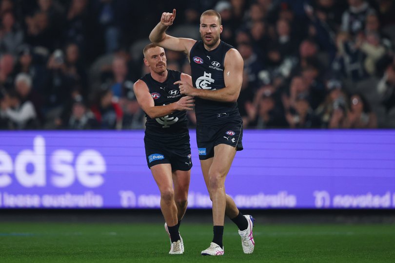 Carlton forward Harry McKay celebrates a goal.