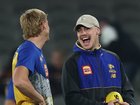 Jack Hutchinson and Harley Reid of the Eagles chat in the warm-up.