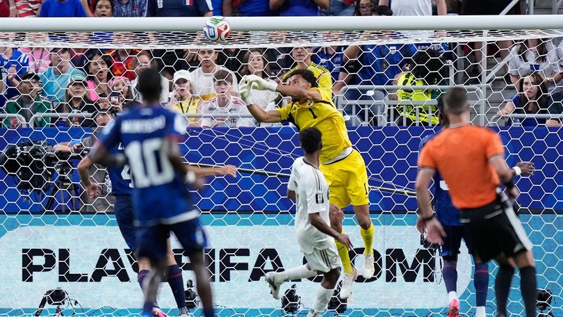 Cape Verde's 40-year-old goalkeeper Vozinha makes another fine save to deny Saudi Arabia. 