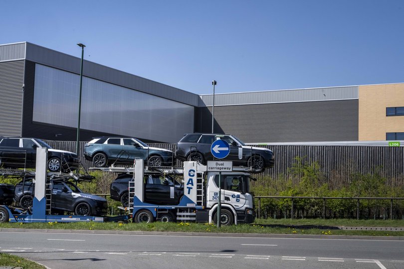 Land Rovers are transported from the Jaguar Land Rover factory in Solihull, England, on April 9, 2025. 