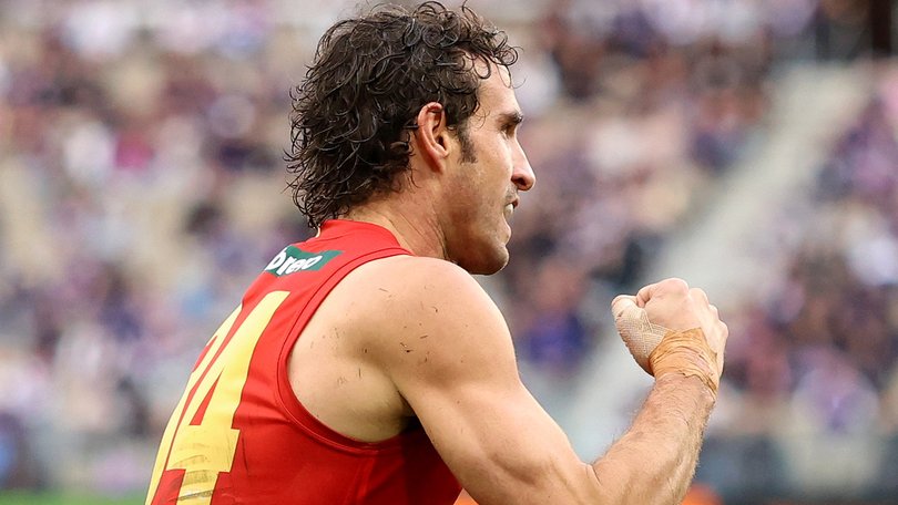 Ben King of the Suns celebrates a goal.