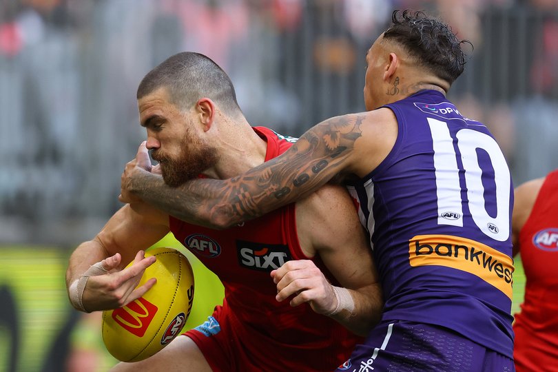PERTH, AUSTRALIA - JUNE 28: Shai Bolton of the Dockers tackles Sam Collins of the Suns during the round 16 AFL match between Fremantle Dockers and Gold Coast Suns at Optus Stadium, on June 28, 2026, in Perth, Australia. (Photo by Paul Kane/Getty Images via AFL Photos)