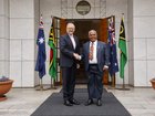 The Prime Minister of Vanuatu Jotham Napat (R) shakes hands with Prime Minister Anthony Albanese at Parliament House.