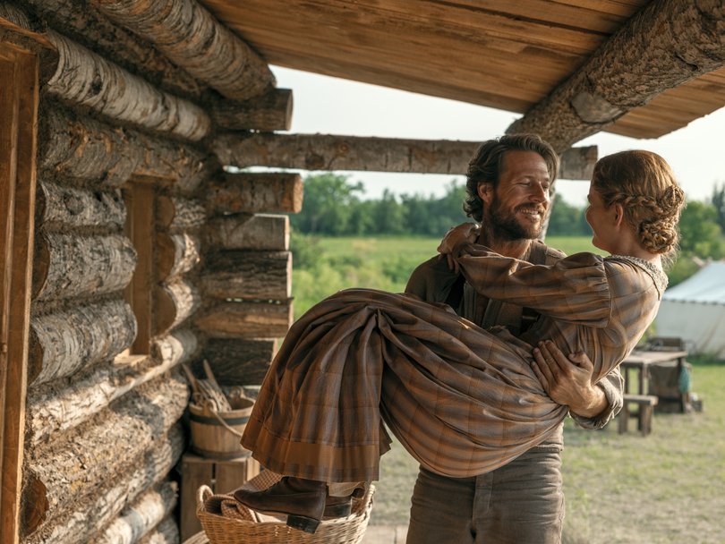 Little House On The Prairie: Luke Bracey as Charles Ingalls and Crosby Fitzgerald as Caroline Ingalls.