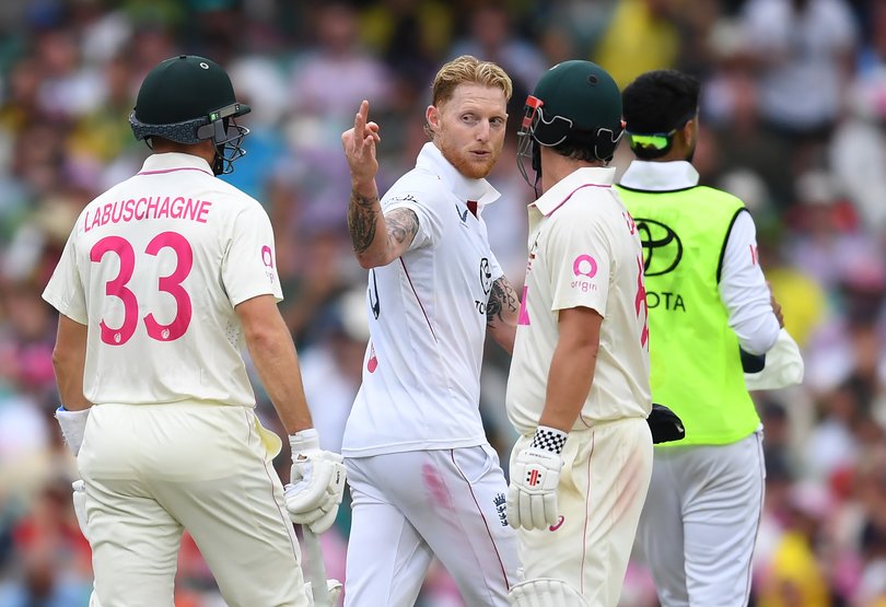 Ben Stokes talks to Marnus Labuschagne and Travis Head during day two of the Fifth Test in the 2025/26 Ashes Series.
