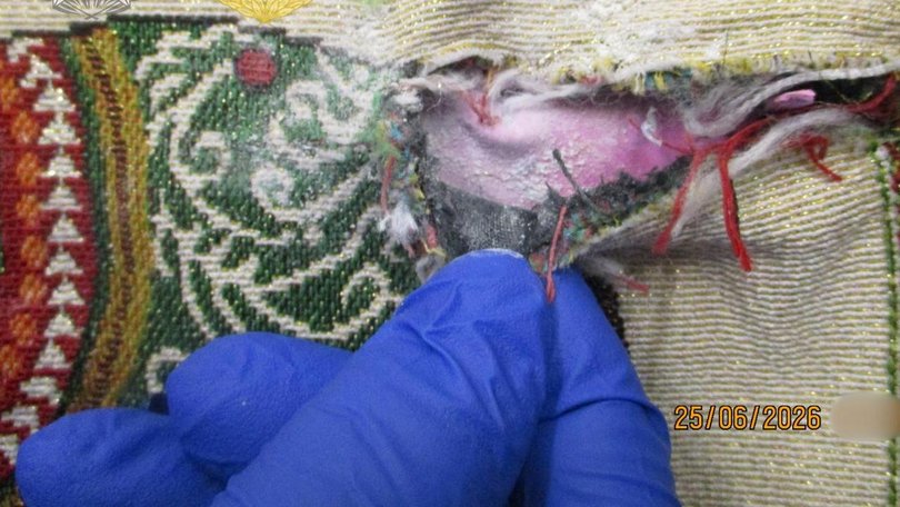 An airline employee has been charged over the alleged importation of heroin uncovered in tote bags. (HANDOUT/AUSTRALIAN BORDER FORCE)