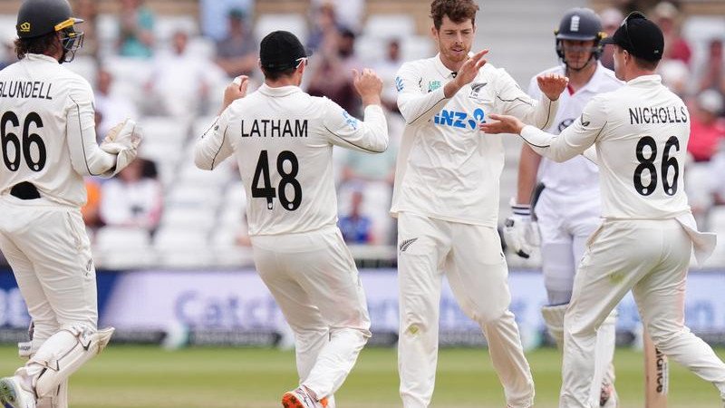 New Zealand's Mitch Santner celebrates with teammates as they close in on Test victory over England. 