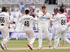 New Zealand's Mitch Santner celebrates with teammates as they close in on Test victory over England. 