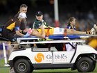 Jordan Lewis is stretchered off the ground after he was knocked out in a 2010 match.  (David Crosling/AAP PHOTOS)
