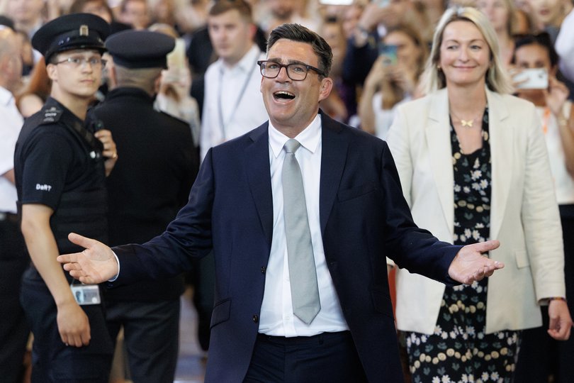 Andy Burnham, Labour MP for Makerfield, celebrates after his swearing-in at the Houses of Parliament.