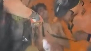 A screengrab from a video shared by the Venezuelan President Delcy Rodri­guez of a 21-year-old man being rescued after being trapped for four days since the earthquake in Venezuela.