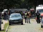 Police and rescuers at the scene where several people were killed in a shooting in Stade, northern Germany.