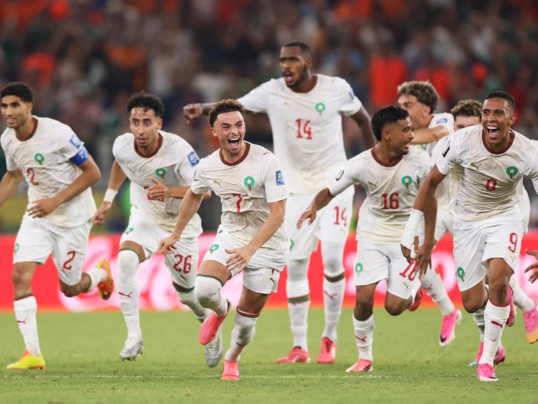 Morocco are through to the last 16 after defeating the Netherlands in a penalty shootout. (Photo by Carl Recine/Getty Images)
