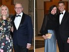 Anthony Albanese (middle left) and wife Jodie Haydon (left) arrive at the Midwinter Ball. Right: Opposition leader Angus Taylor and wife Louise Clegg.