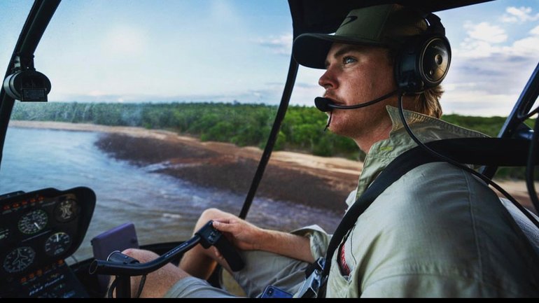 Pilot Sebastian Robinson, who was critically injured in the chopper crash that killed Netflix star Chris Wilson, is expected to give evidence at Outback Wrangler Matt Wright’s criminal trial in Darwin.
PICTURED: Pilot Sebastian Robinson