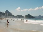 People enjoy the magnificent view from Copacabana Beach. 