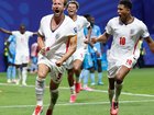 Harry Kane (9) celebrates after scoring his first goal to set England on the path to a 2-1 victory. 