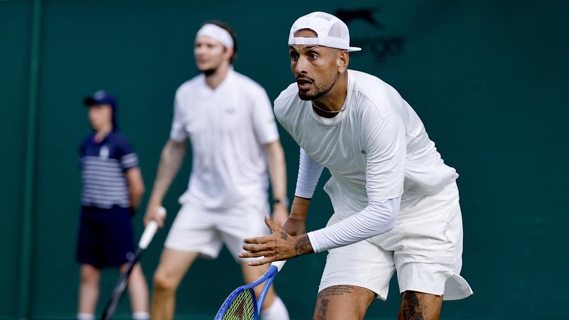 Nick Kyrgios has made an unsuccesful Wimbledon return, playing doubles with Alexander Bublik. (EPA PHOTO)