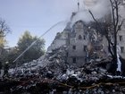 Firefighters battle major fires after a drone and missile attack by Russian forces on July 2, 2026 in Kyiv.